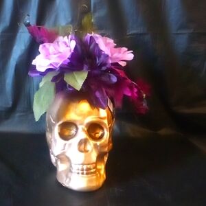 Halloween skull floral arrangement with roses and purple leaves Wicked Garden